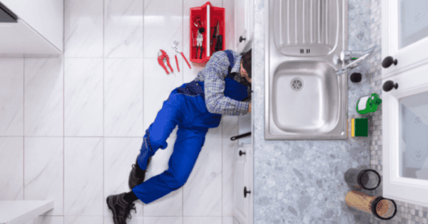 plumber under sink