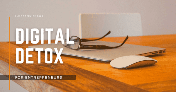 glasses on top of laptop with text 'digital detox for entrepreneurs'